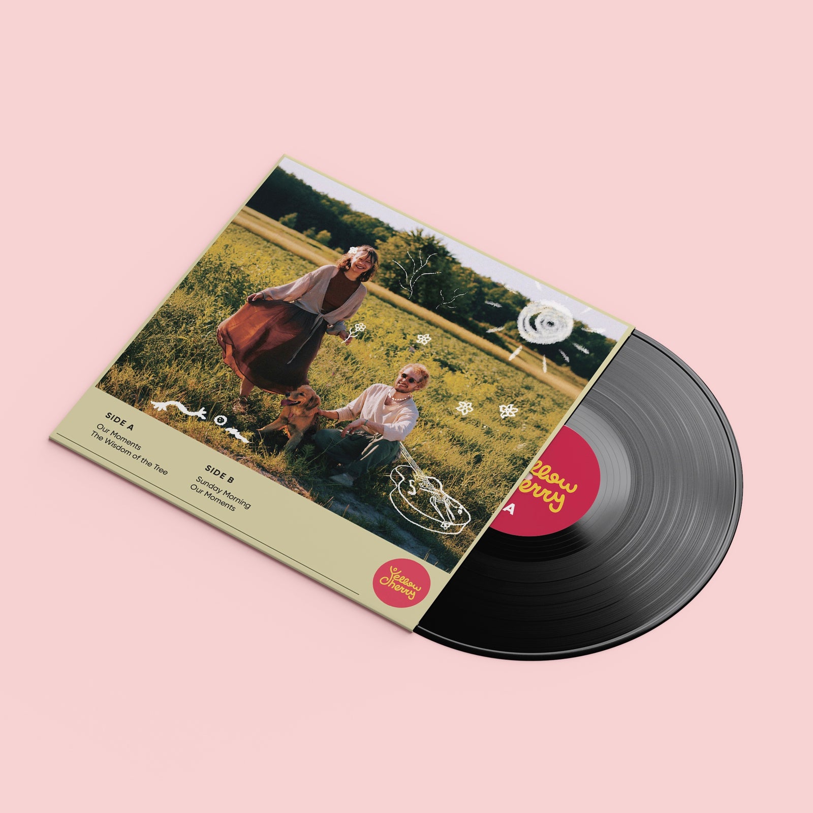 Vinyl record with a cover featuring two people in a field on a pink background